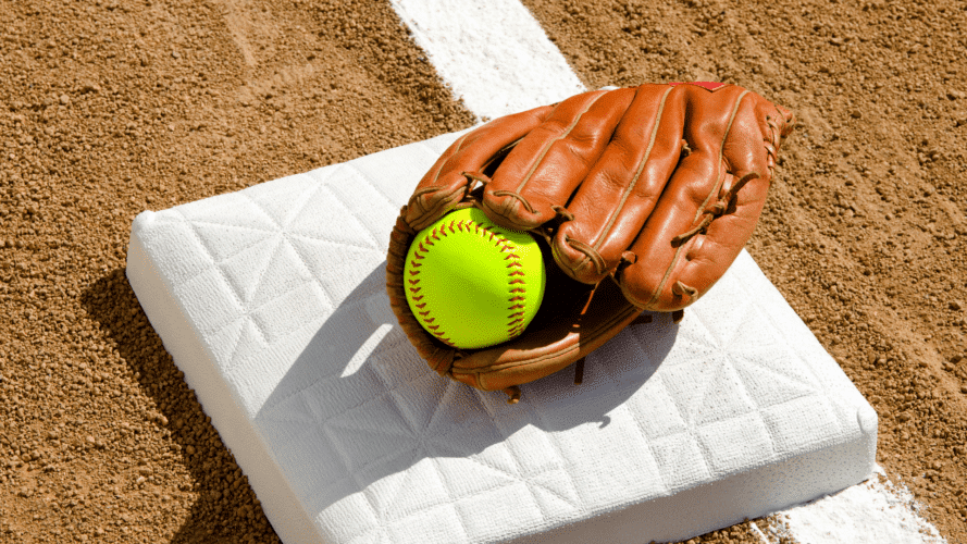softball glove on first base