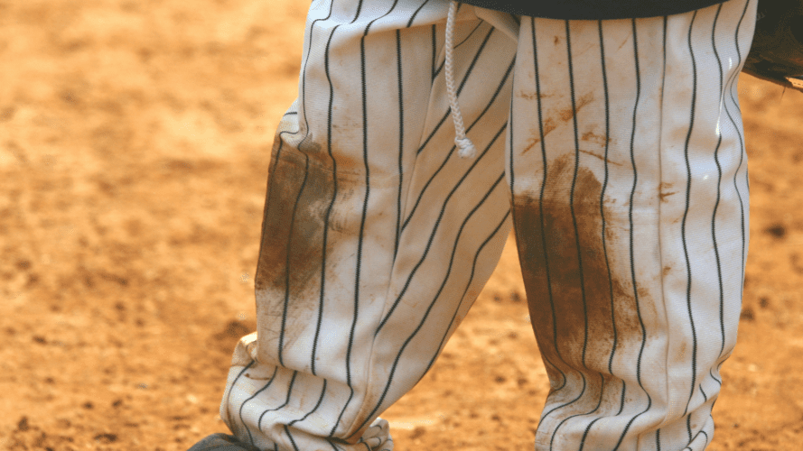 A baseball player wearing pants
