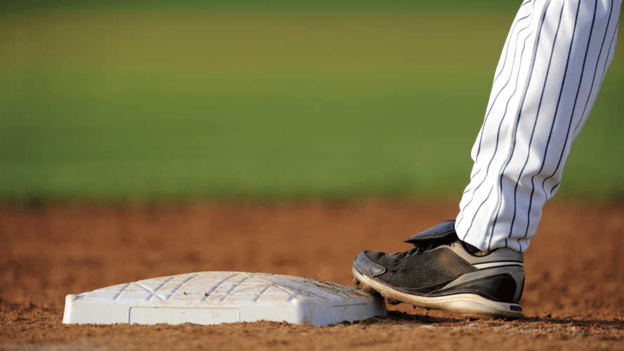 Baseball player's cleat standing on a base